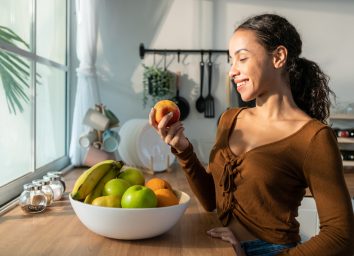 woman eating fruit