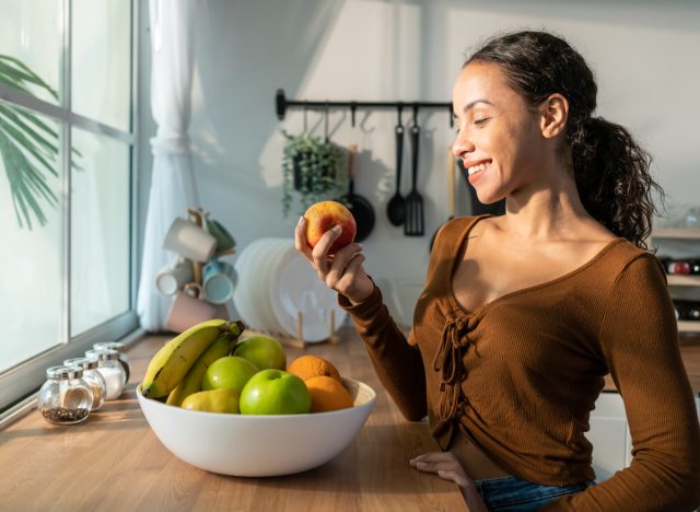 woman eating fruit