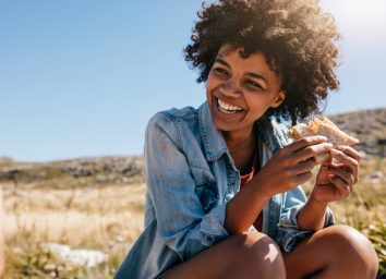 woman eating sandwich