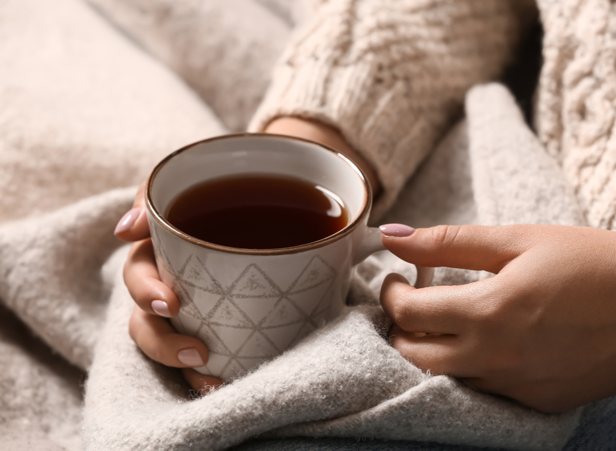 woman holding tea mug