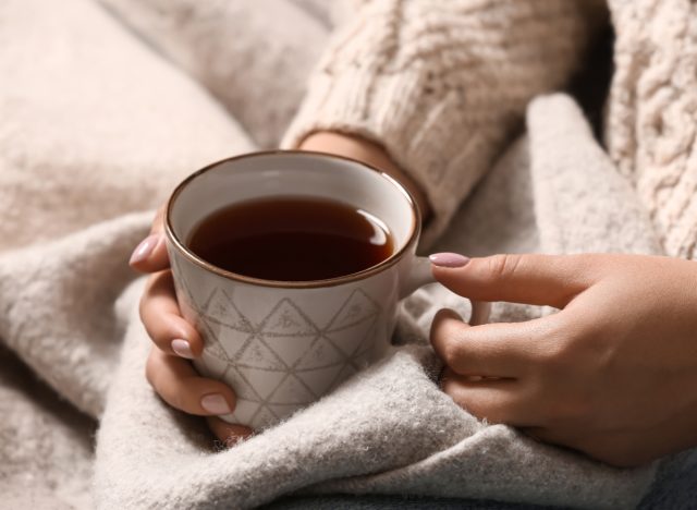 woman holding tea mug