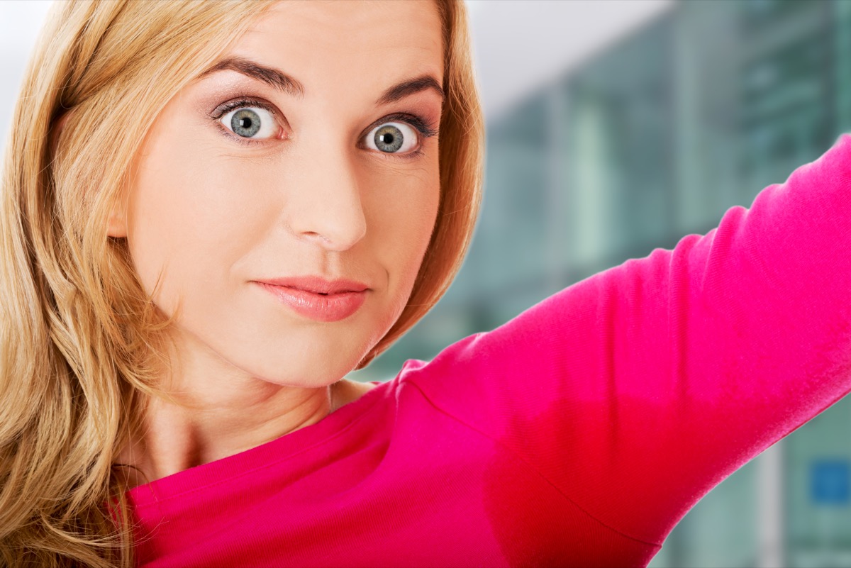 Young,Woman,Having,Sweating,Problem