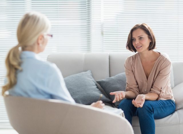 female patient chatting with therapist