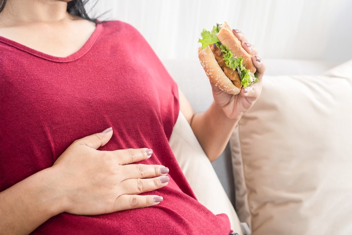 Woman Eating Sandwich, Full Belly