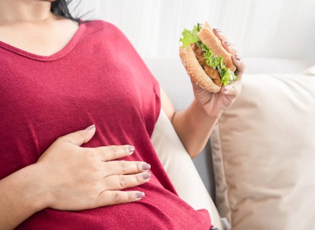 Woman Eating Sandwich, Full Belly