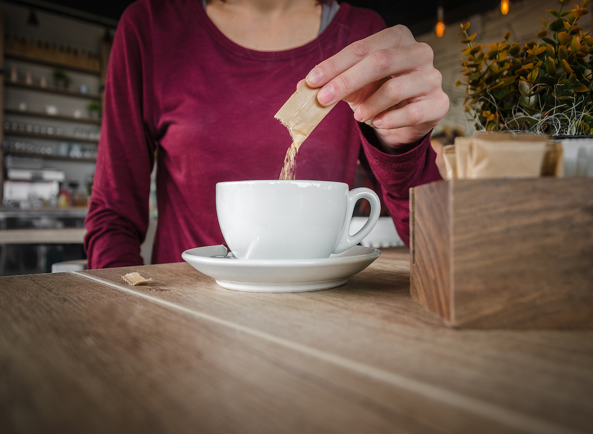 Woman Pouring Sugar