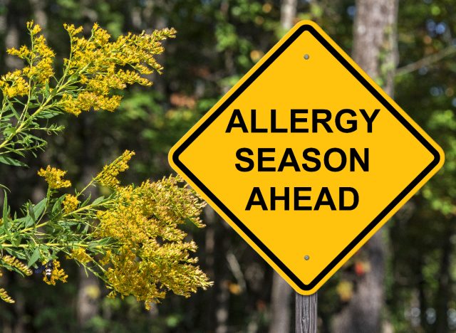 bright yellow sign allergy season ahead, side effects of seasonal allergies