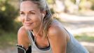 mature athletic woman exercising outdoors to get a lean body after 50