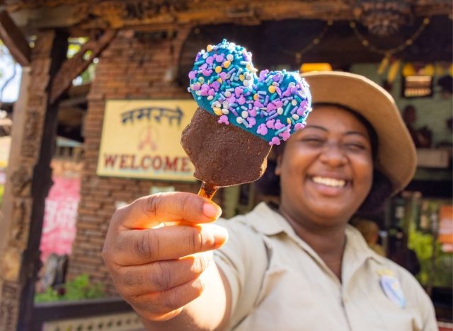 disney worker with food