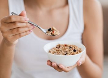 eating scoop of oatmeal