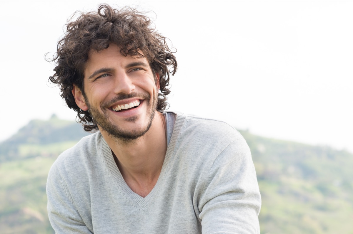 Portrait,Of,Young,Handsome,Man,Smiling,Outdoor