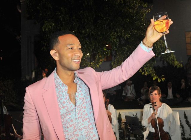 john legend with glass