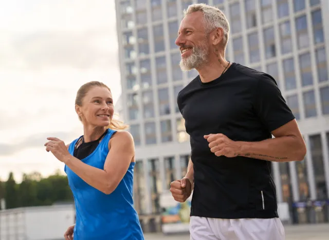 mature couple jogging outdoors