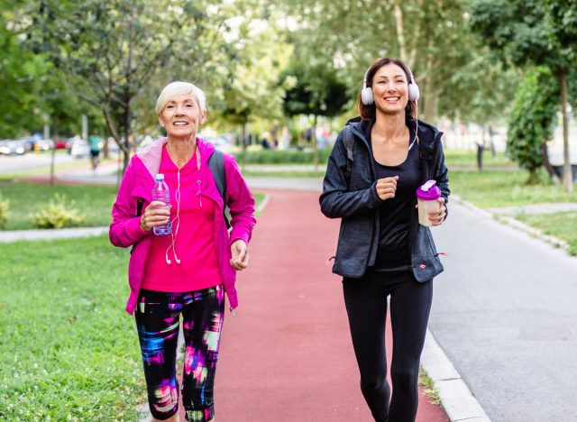 mother daughter duo walking, following exercise tricks for slimming down after 60