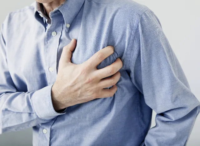 older man experiencing chest pain, heart attack