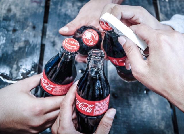 opening coca cola bottles