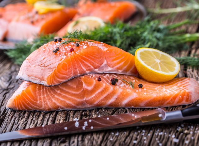 salmon fillets with pepper, salt, dill, and lemon