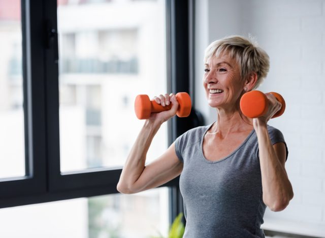 senior woman lifting weights