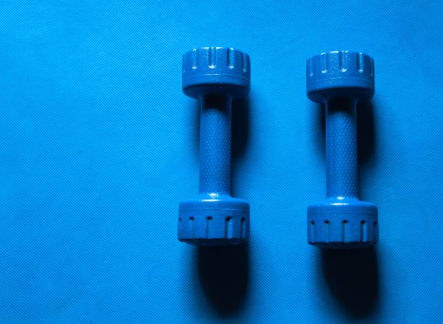 set of blue dumbbells