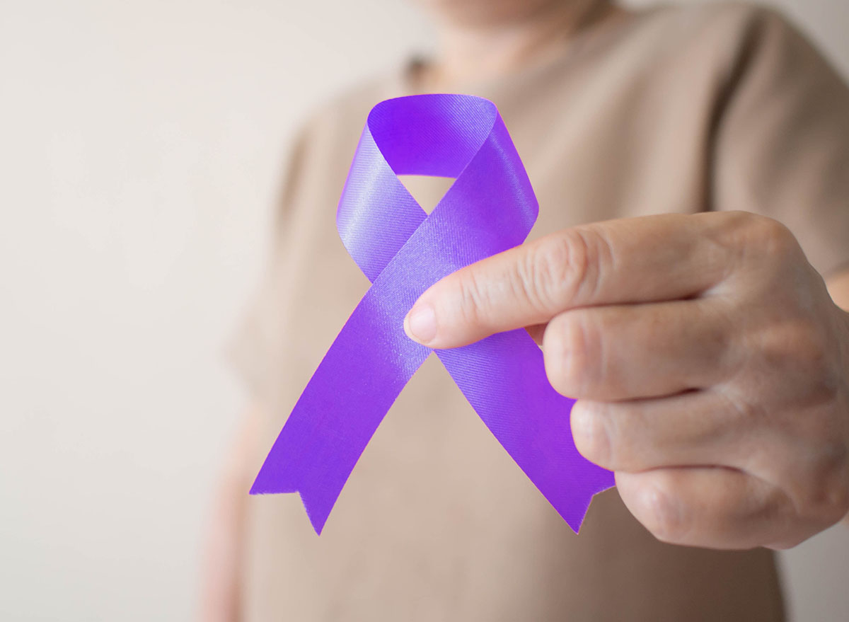 Elderly,Woman,Holding,Purple,Ribbon,Awareness,W/,Copy,Space.,Symbol