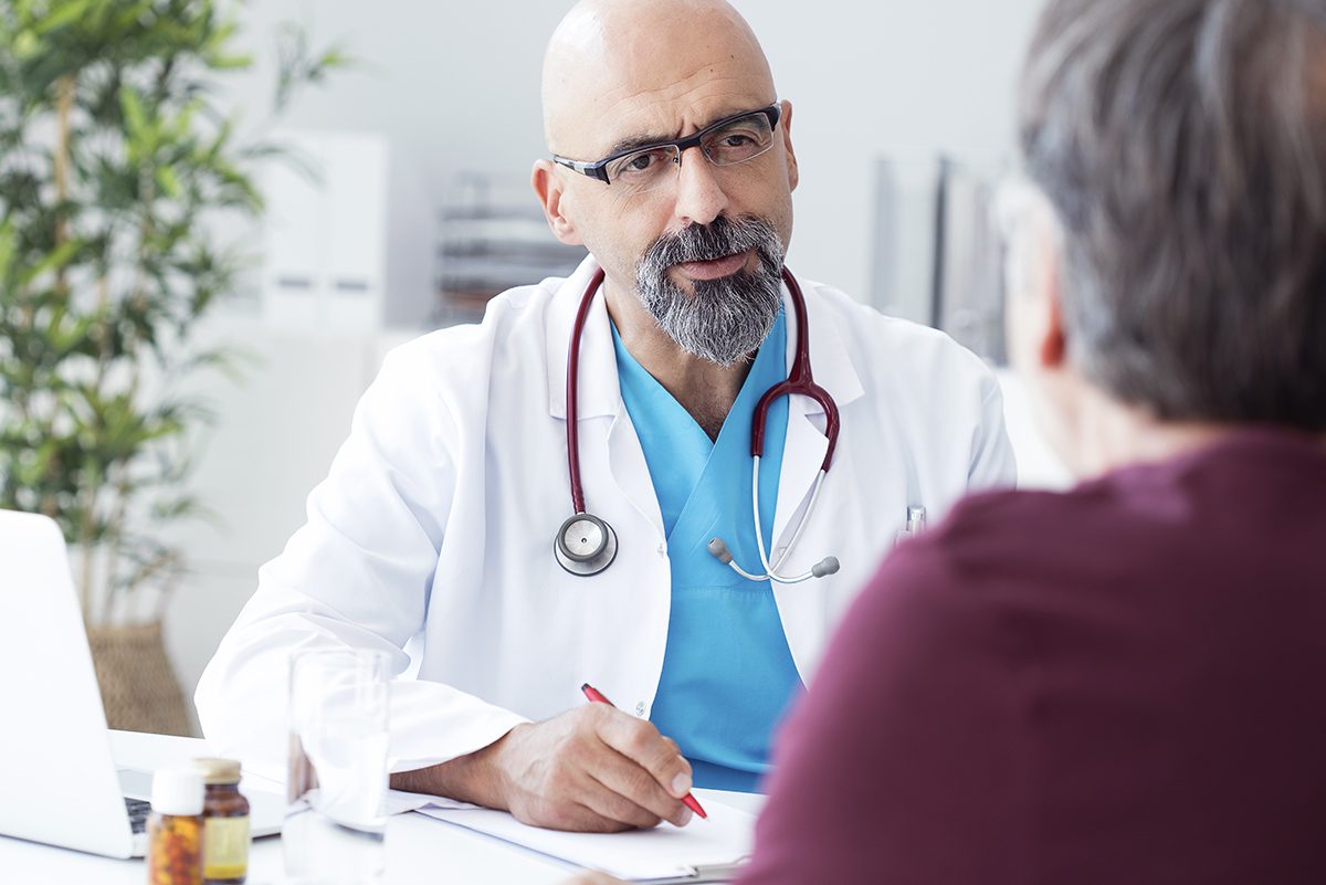 Male,Doctor,Talking,To,Patient