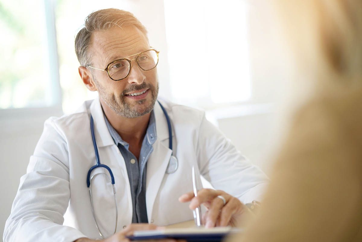 Doctor,With,Patient,In,Medical,Office