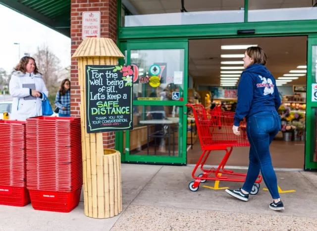 trader joes employee pushing cart