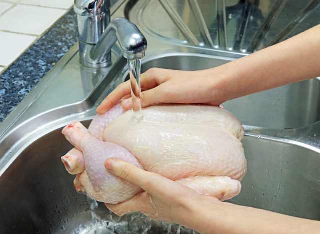 washing raw chicken
