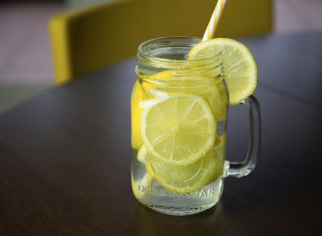 water with lemon ready for drinking on table, concept of morning routine to lose weight fast