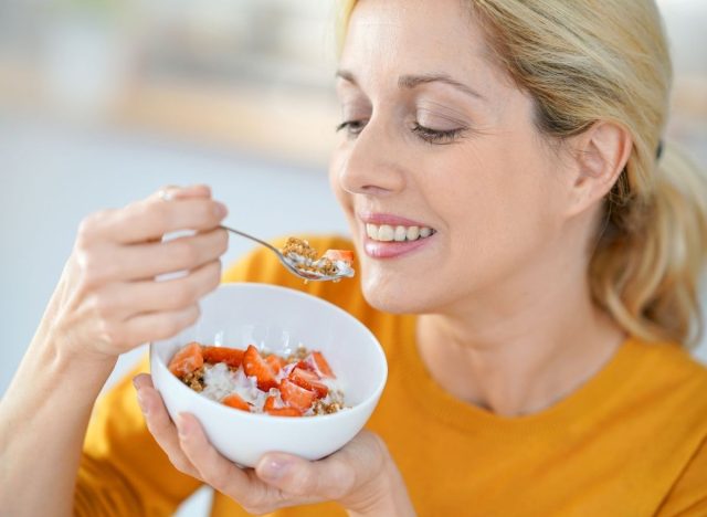 woman eating yogurt