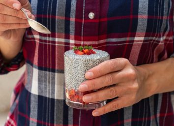 woman holding chia seed pudding