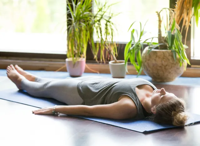 woman on yoga mat performing exercise, shrink inner thigh fat fast