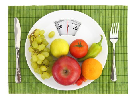 Fruit and veggies on scale