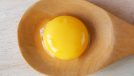 Egg Yolk on wooden spoon