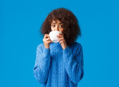 Woman drinking out of mug