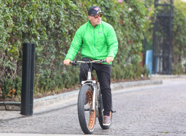 Arnold Schwarzenegger riding bike