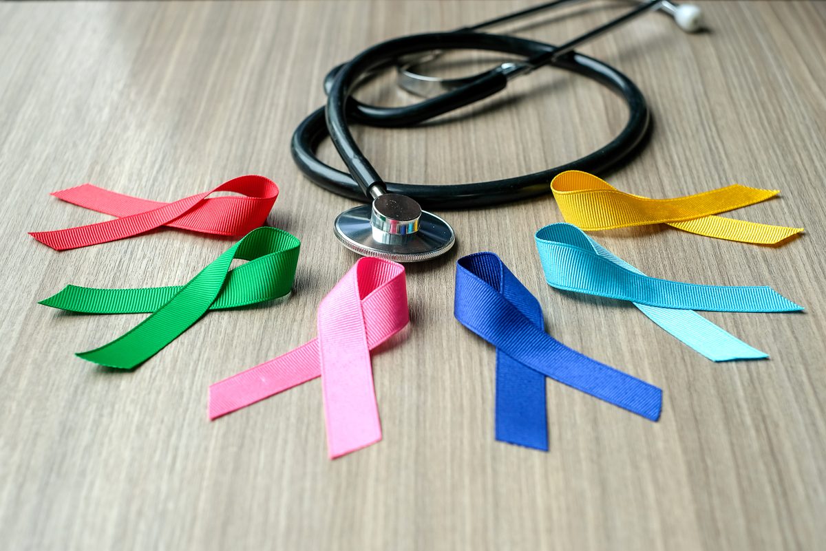 cancer awareness ribbons and stethoscope