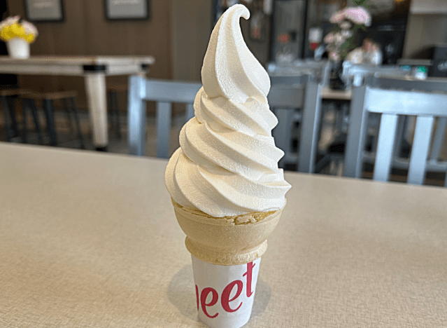 an ice cream cone on a table at chick-fil-a