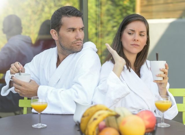 couple having argument outside at breakfast