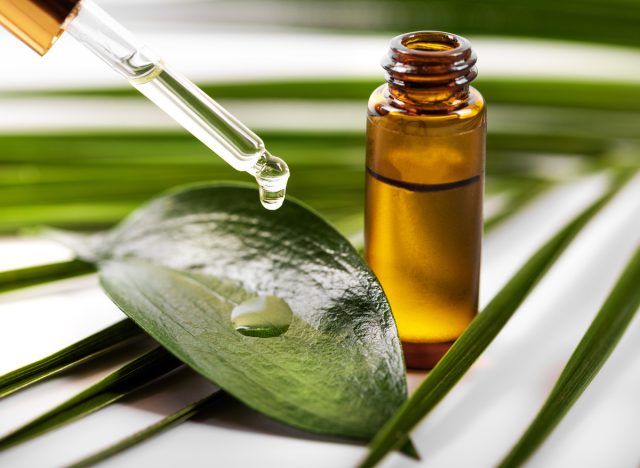 essential oil dripping onto leaf