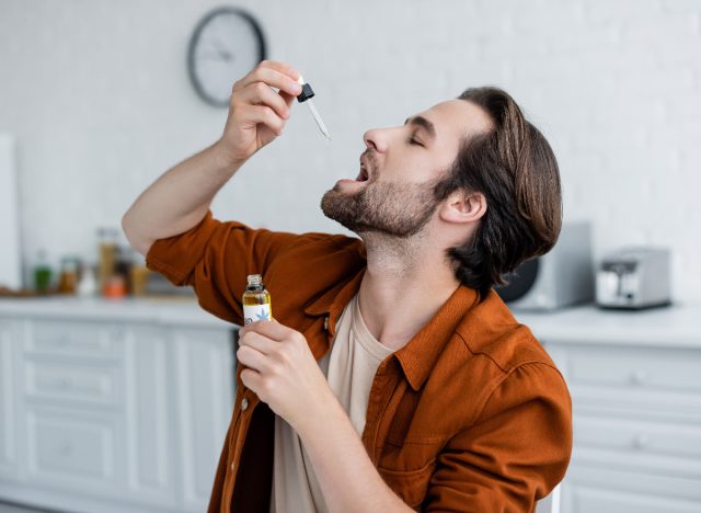 man taking CBD