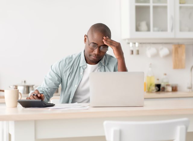 mature man stressed working from home