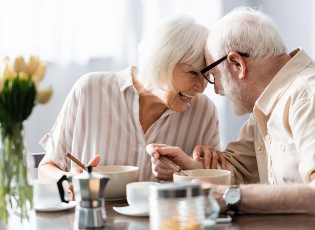 old couple eating breakfast