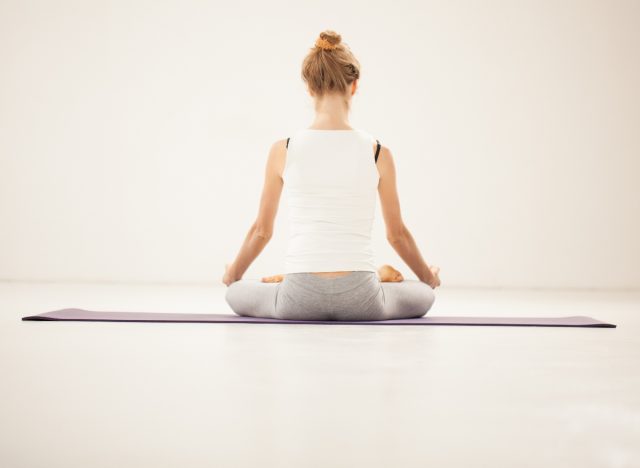 woman performing shoulder circles