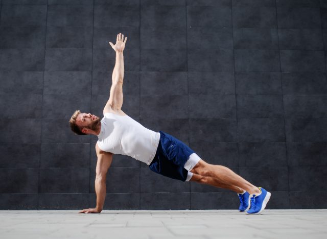 man performing T-pushup as part of bodyweight workout