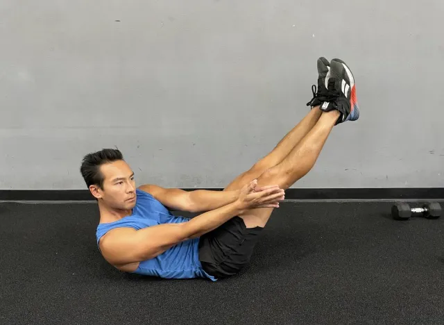 trainer doing v-twist