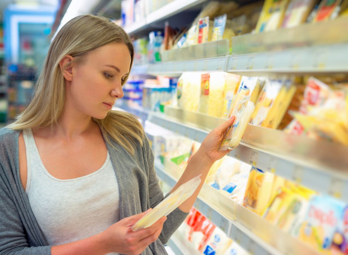 Woman choosing cheese