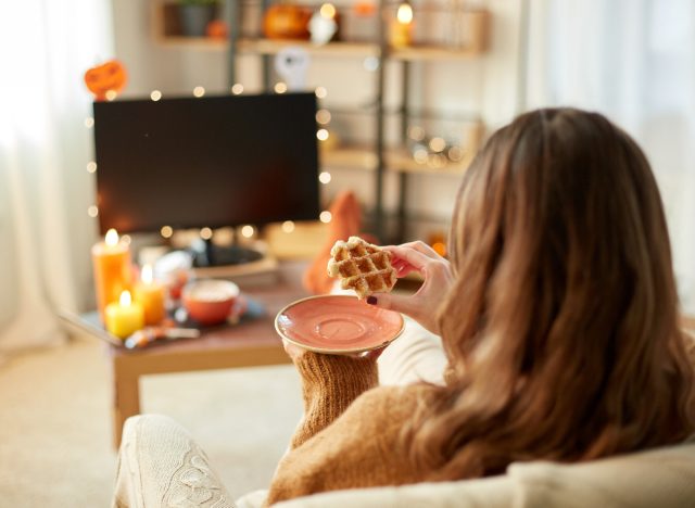 woman cozy on couch in the fall, step debt