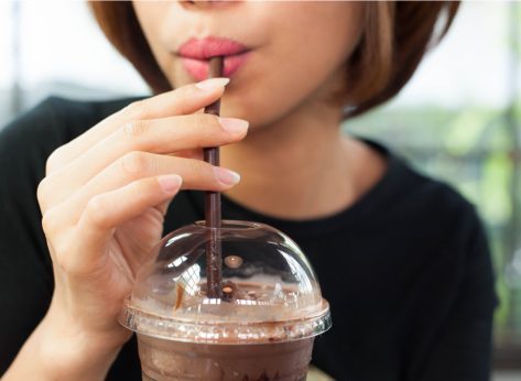 woman drinking chocolate frappe