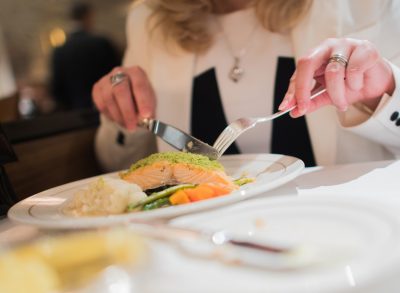 woman eating salmon